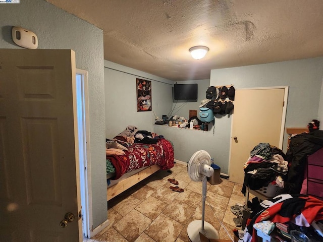 bedroom with a textured ceiling