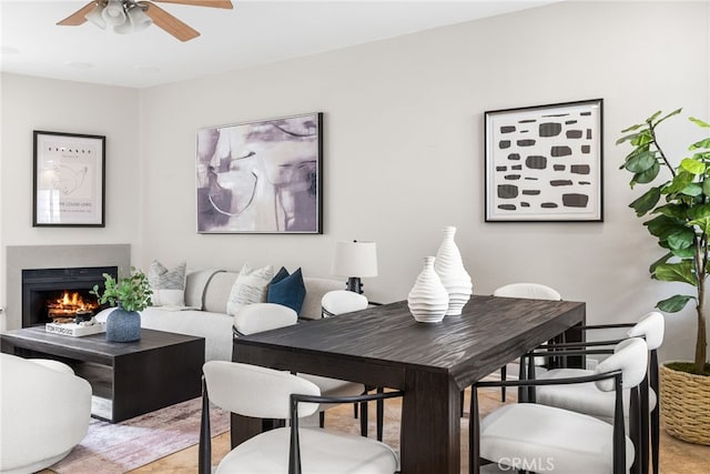 dining space with ceiling fan