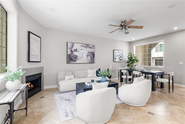 living room with ceiling fan