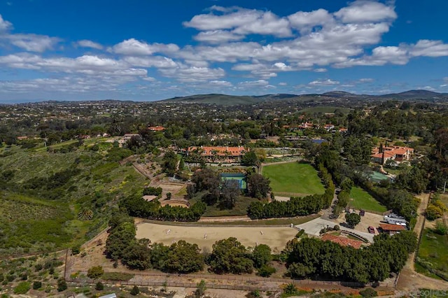 drone / aerial view featuring a mountain view