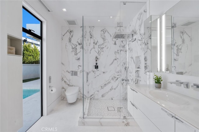 bathroom featuring walk in shower, vanity, and toilet