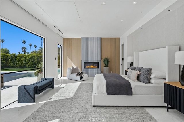 bedroom with a large fireplace