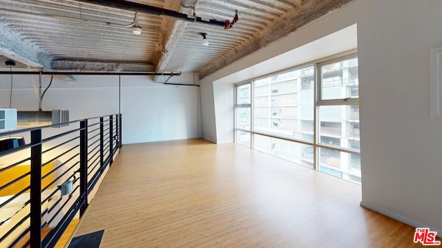 interior space with hardwood / wood-style floors