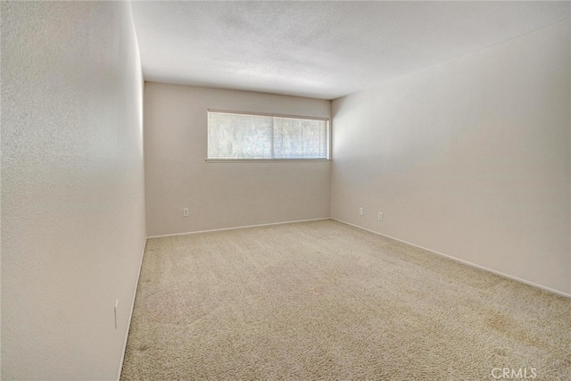 empty room with carpet floors