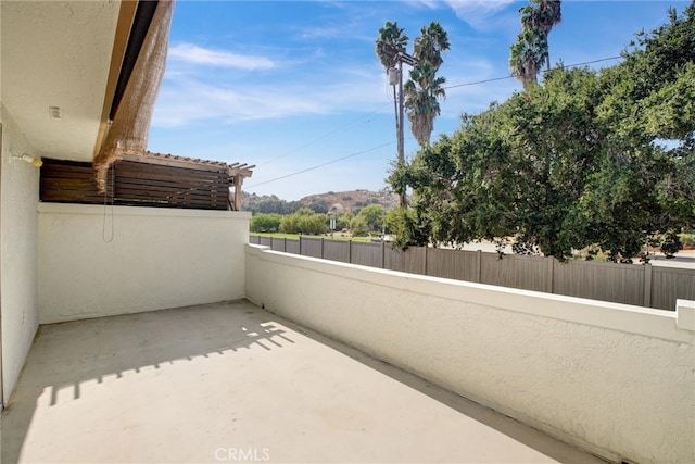 view of patio / terrace featuring a mountain view