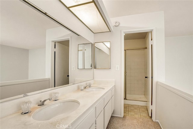 bathroom with vanity and an enclosed shower