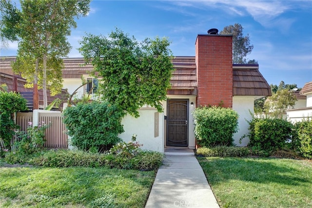 view of front of house with a front yard