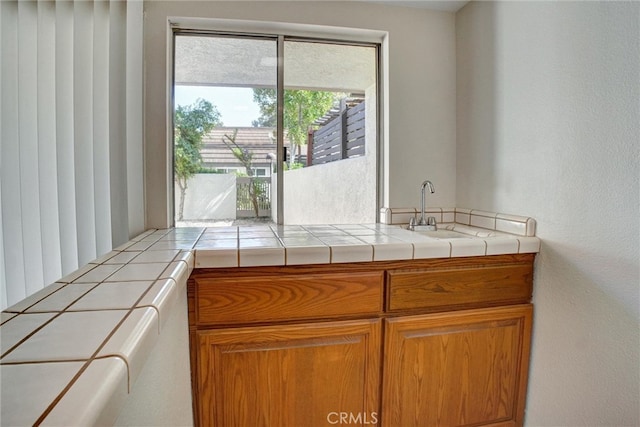 kitchen featuring tile countertops