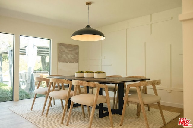 dining room featuring light hardwood / wood-style flooring