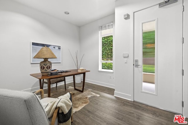 home office featuring dark hardwood / wood-style flooring