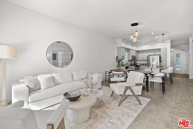 living room featuring light tile patterned flooring