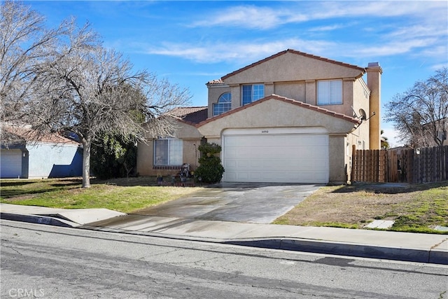 view of front property featuring a garage and a front lawn