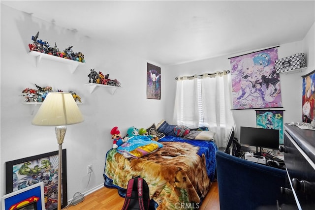 bedroom featuring hardwood / wood-style floors