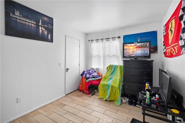 game room with hardwood / wood-style flooring