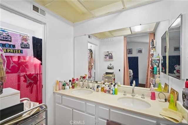 bathroom featuring vanity