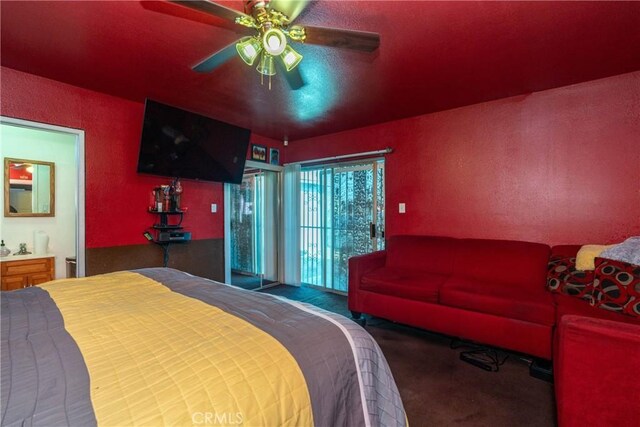 bedroom with carpet flooring, ensuite bathroom, and ceiling fan