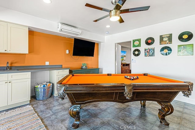 playroom with pool table, sink, ceiling fan, and a wall unit AC