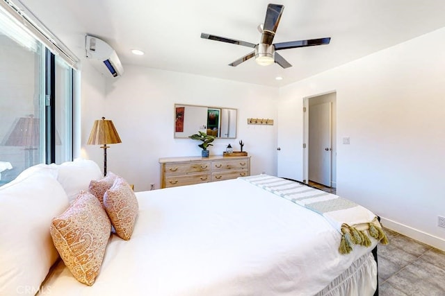 bedroom featuring ceiling fan and a wall mounted air conditioner