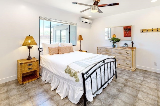 bedroom with ceiling fan and a wall unit AC