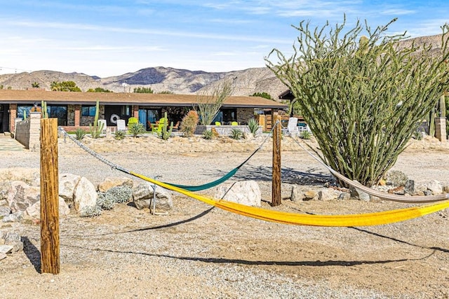 view of community with a mountain view