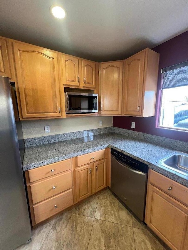 kitchen with sink and stainless steel appliances