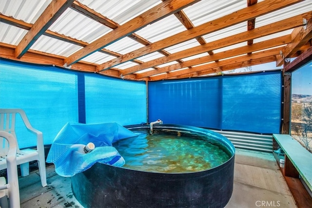 view of pool featuring a hot tub