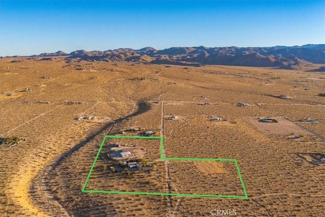 5975 Desert Star Rd Unit 1-2, Johnson Valley, CA 92285 - bird's eye view with view of desert, a mountain view, and a rural view