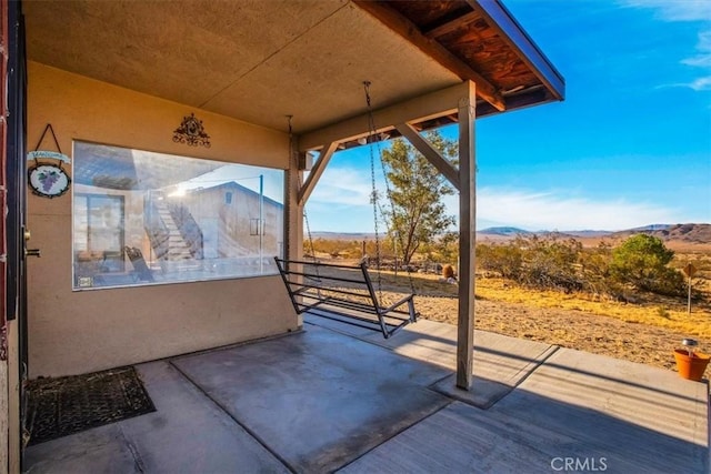 5975 Desert Star Rd Unit 1-2, Johnson Valley, CA 92285 - view of patio / terrace featuring a mountain view