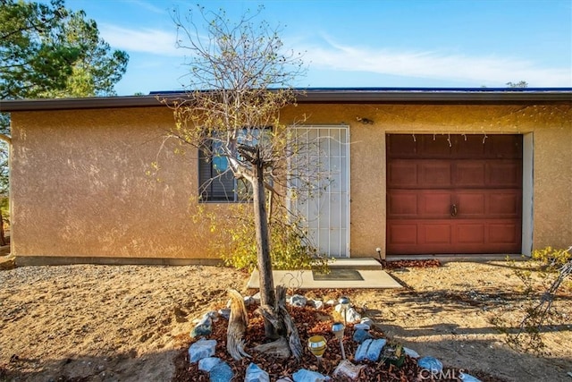 exterior space featuring a garage