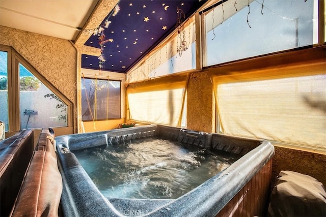 bathroom with lofted ceiling