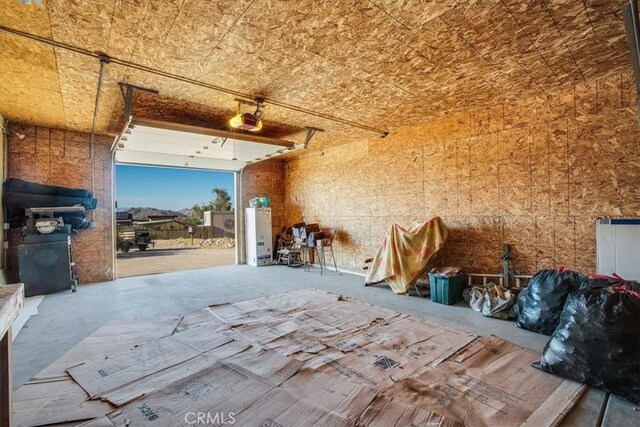 5975 Desert Star Rd Unit 1-2, Johnson Valley, CA 92285 - misc room with a garage