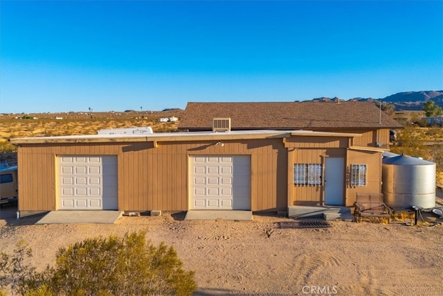 exterior space featuring a mountain view