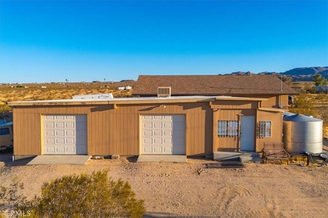 5975 Desert Star Rd Unit 1-2, Johnson Valley, CA 92285 - rear view of property featuring a mountain view