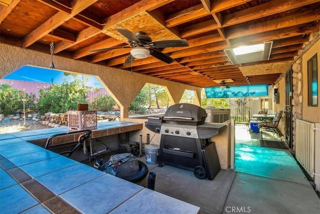 5975 Desert Star Rd Unit 1-2, Johnson Valley, CA 92285 - view of patio featuring a ceiling fan, fence, and area for grilling