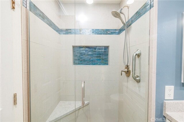 bathroom featuring walk in shower