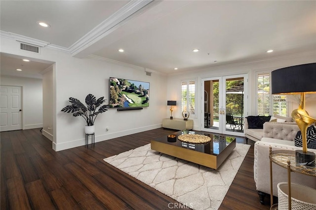 living room featuring ornamental molding, dark hardwood / wood-style floors, and french doors