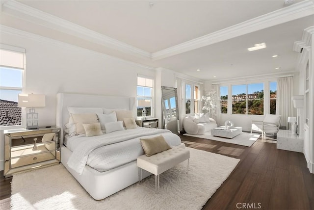 bedroom with crown molding and wood-type flooring