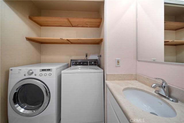 laundry room with sink and washer and dryer