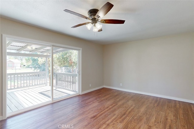 unfurnished room featuring wood-type flooring and ceiling fan