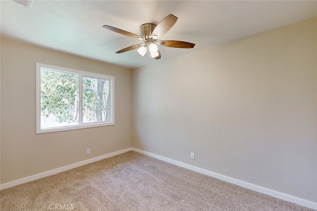 empty room with light carpet and ceiling fan