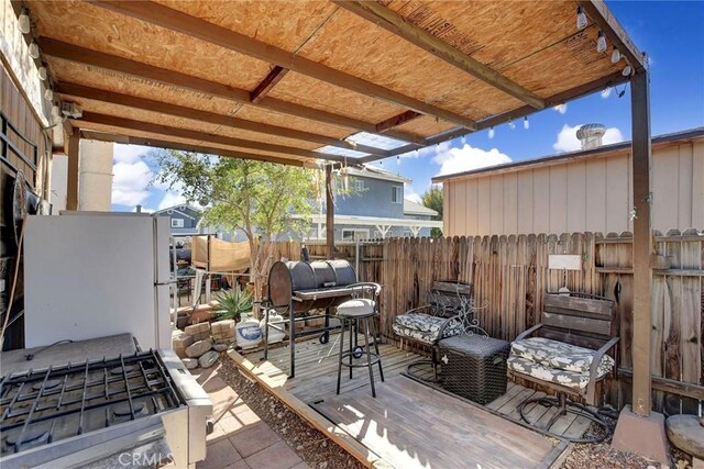 view of patio / terrace with a wooden deck