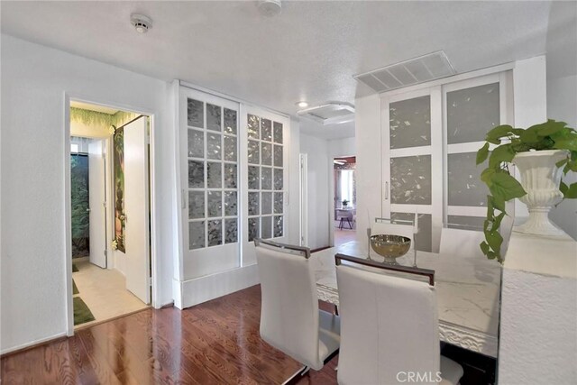 dining room featuring dark hardwood / wood-style floors