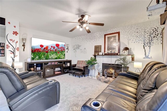 living room featuring carpet flooring and ceiling fan