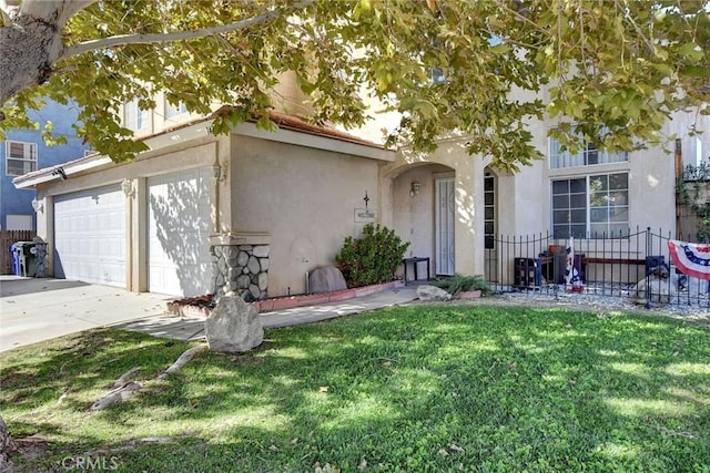 view of front of house with a garage and a front lawn