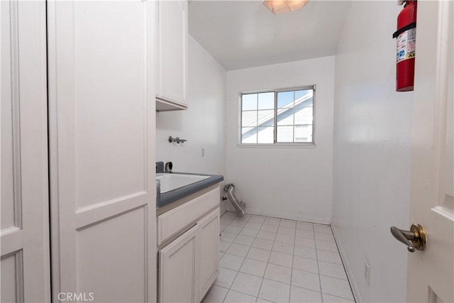 bathroom featuring tile patterned floors and vanity