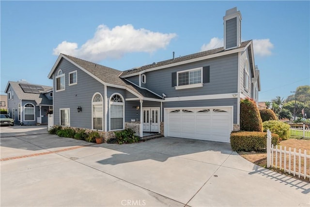 front of property with a garage