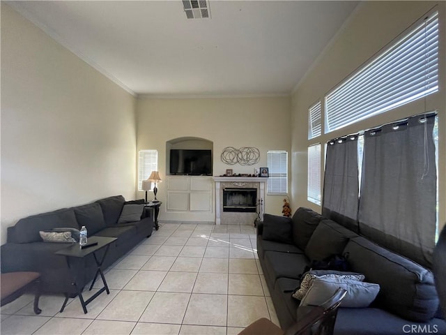 tiled living room with ornamental molding