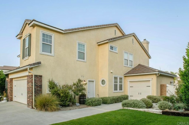 view of front of home with a garage