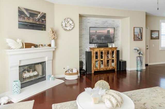 living room featuring dark wood-type flooring