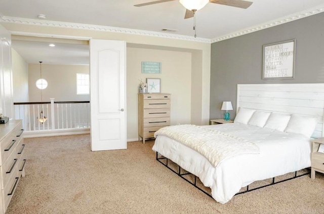 bedroom featuring light carpet and ceiling fan